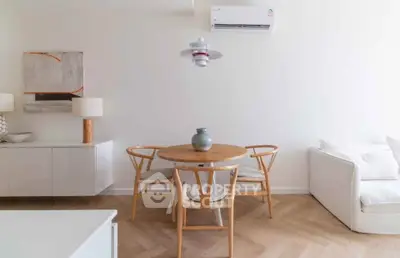 Chic modern living room with Scandinavian design, featuring a cozy dining area and stylish furniture.