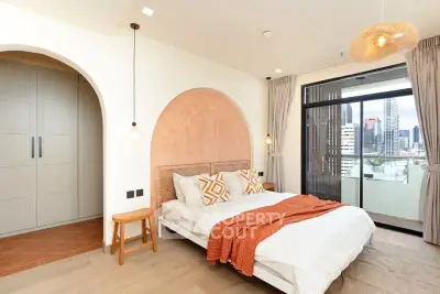 Luxurious bedroom with city view and stylish decor in modern apartment