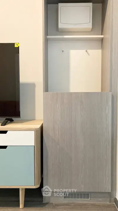 Modern living room with stylish TV stand and storage unit
