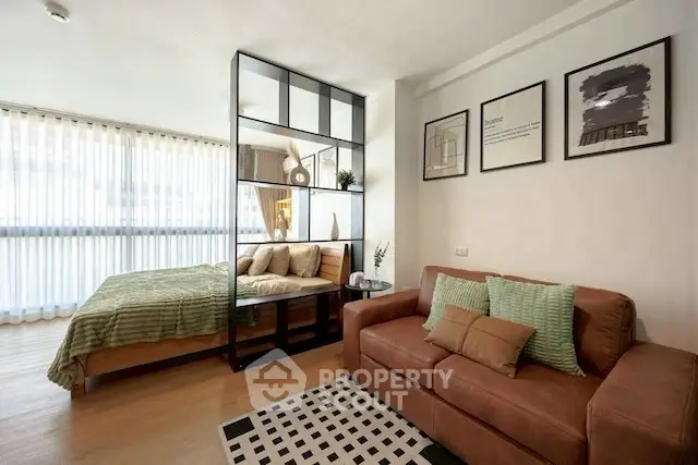 Stylish studio apartment with modern decor and cozy living area