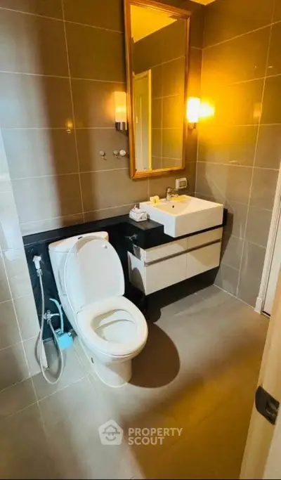 Modern bathroom with sleek fixtures and ambient lighting