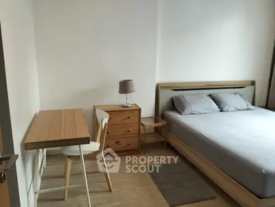 Cozy bedroom with modern wooden furniture and natural light