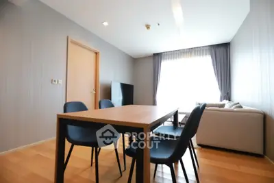 Modern living room with stylish furniture and natural light