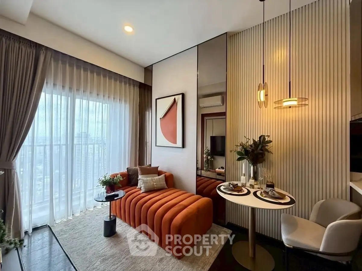 Stylish modern living room with chic decor and city view, perfect for urban living.
