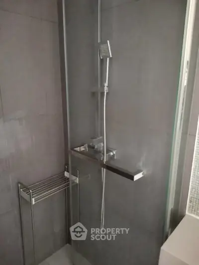 Modern bathroom shower with sleek design and chrome fixtures