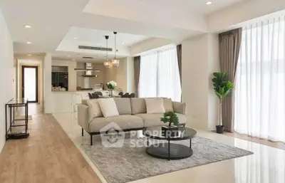 Spacious modern living room with open kitchen and elegant decor