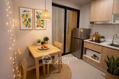 Cozy kitchen with wooden cabinets, dining table, and modern appliances in a stylish apartment.