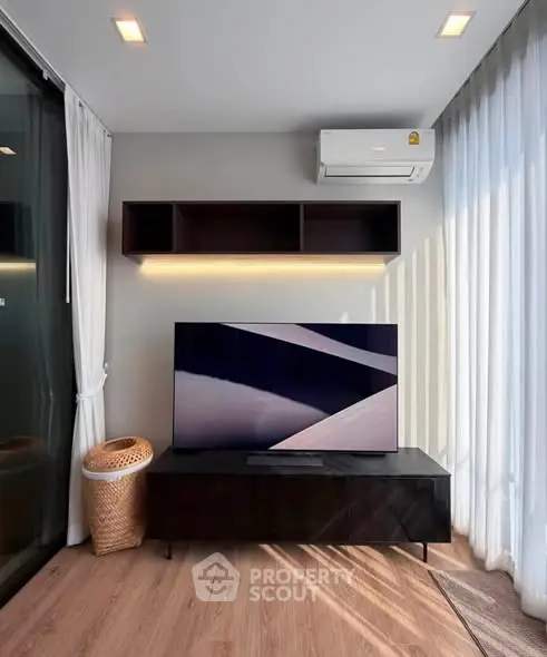 Modern living room with sleek TV setup and stylish decor