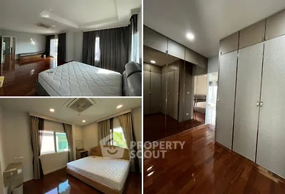 Spacious bedroom with hardwood floors and ample natural light
