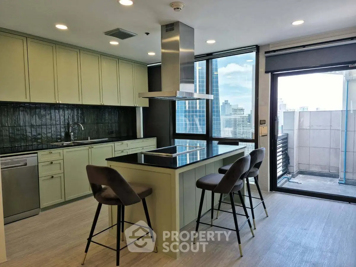 Modern kitchen with island and city view, featuring sleek cabinetry and bar seating.