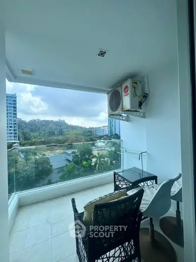 Modern balcony with scenic view and stylish outdoor seating