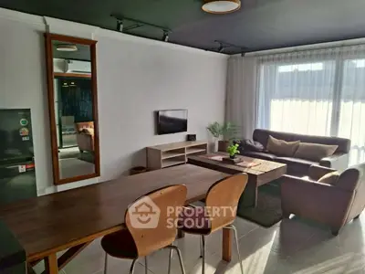 Stylish living room with modern furniture and natural light