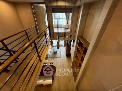 Stunning loft-style living room with high ceilings and modern design