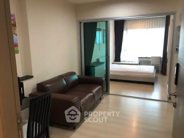 Modern apartment interior with cozy living area and spacious bedroom