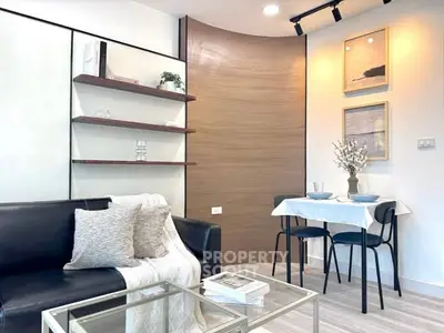 Modern living room with sleek furniture and stylish decor