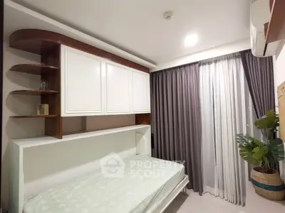 Modern bedroom with built-in storage and stylish curtains