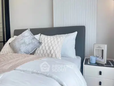 Cozy bedroom with stylish decor and modern bedside table