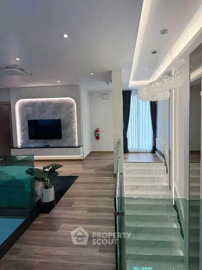 Luxurious modern living room with elegant lighting and stylish decor