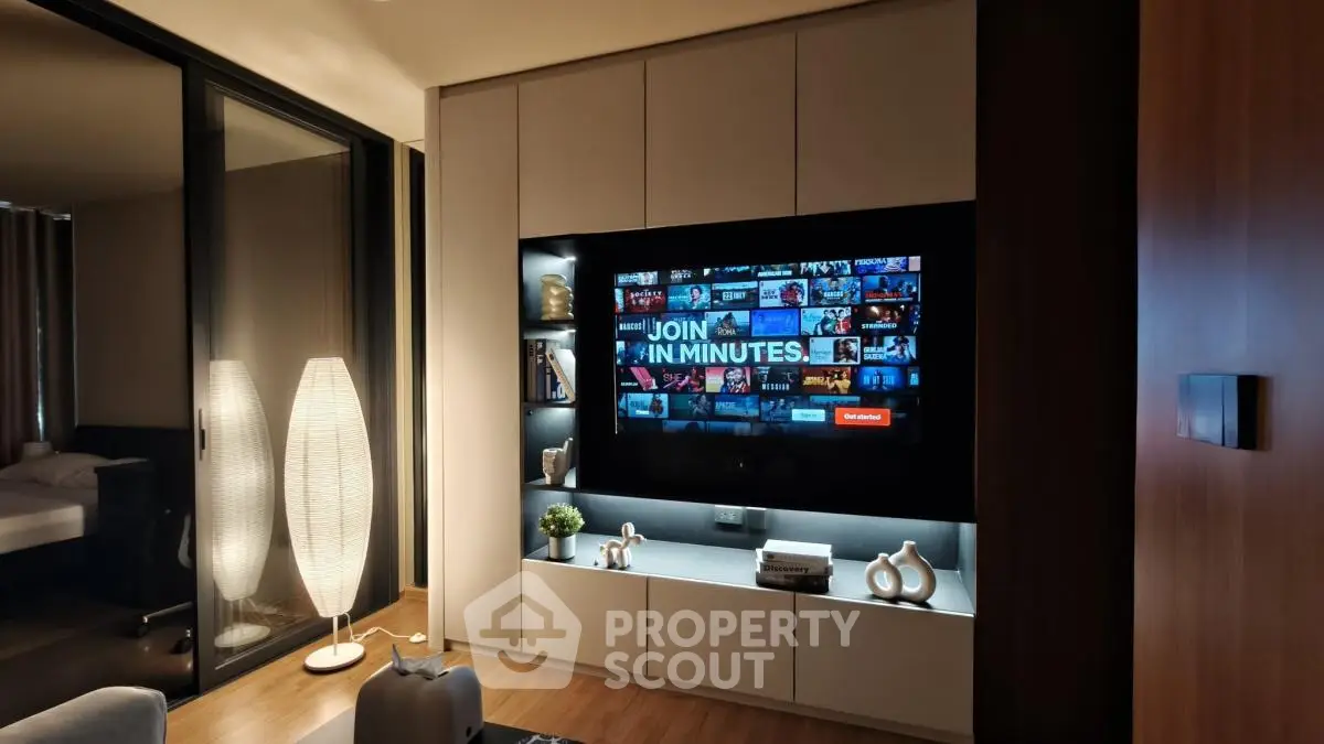 Modern living room with sleek entertainment center and ambient lighting