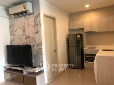 Modern apartment interior with sleek kitchen and stylish living area