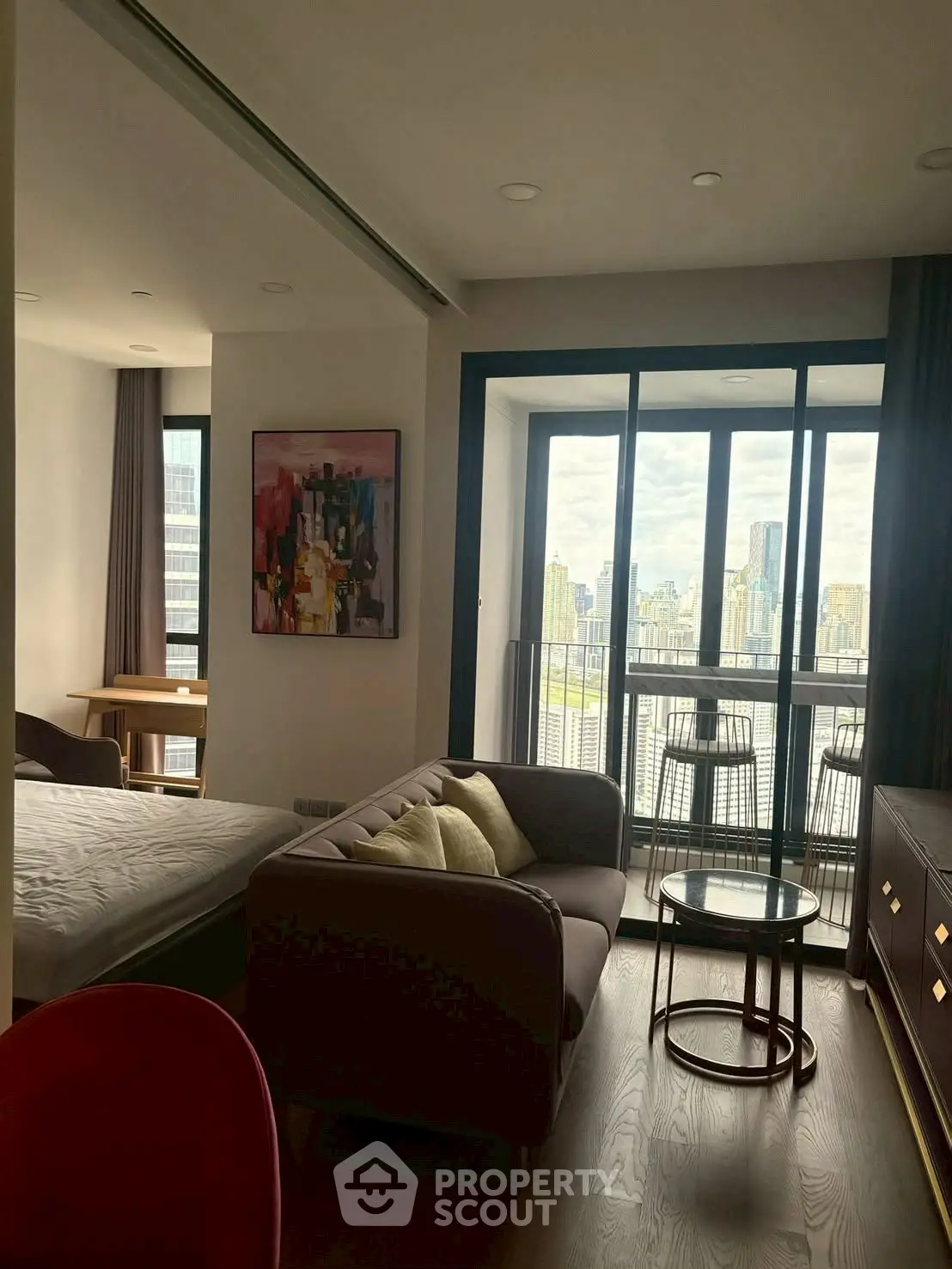 Modern studio apartment with stunning city view and stylish interior design