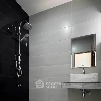Modern bathroom with sleek shower and stylish sink design