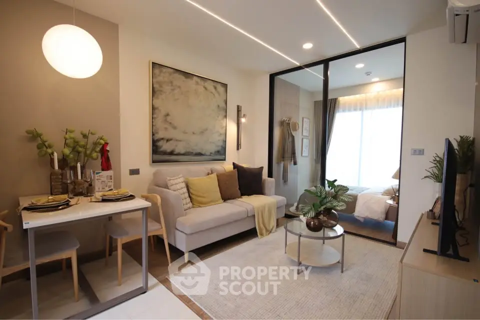 Modern living room with cozy decor and stylish furniture in a contemporary apartment.