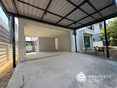 Spacious covered parking area with modern design in a residential property