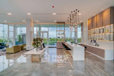 Luxurious modern living room with elegant decor and stunning city view.