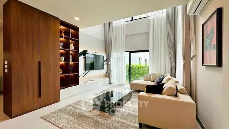 Luxurious modern living room with high ceilings and elegant decor