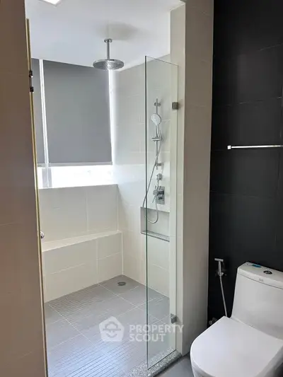 Modern bathroom with glass shower and sleek design