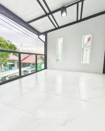 Spacious balcony with modern design and great view, perfect for relaxation and outdoor activities.
