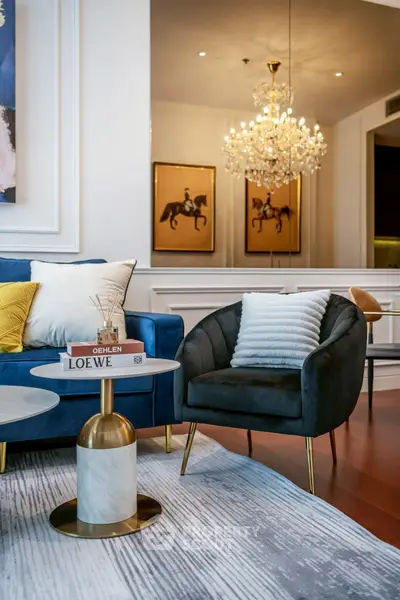 Luxurious living room with elegant chandelier and stylish furniture