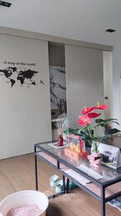 Modern living room with world map wall art and stylish decor
