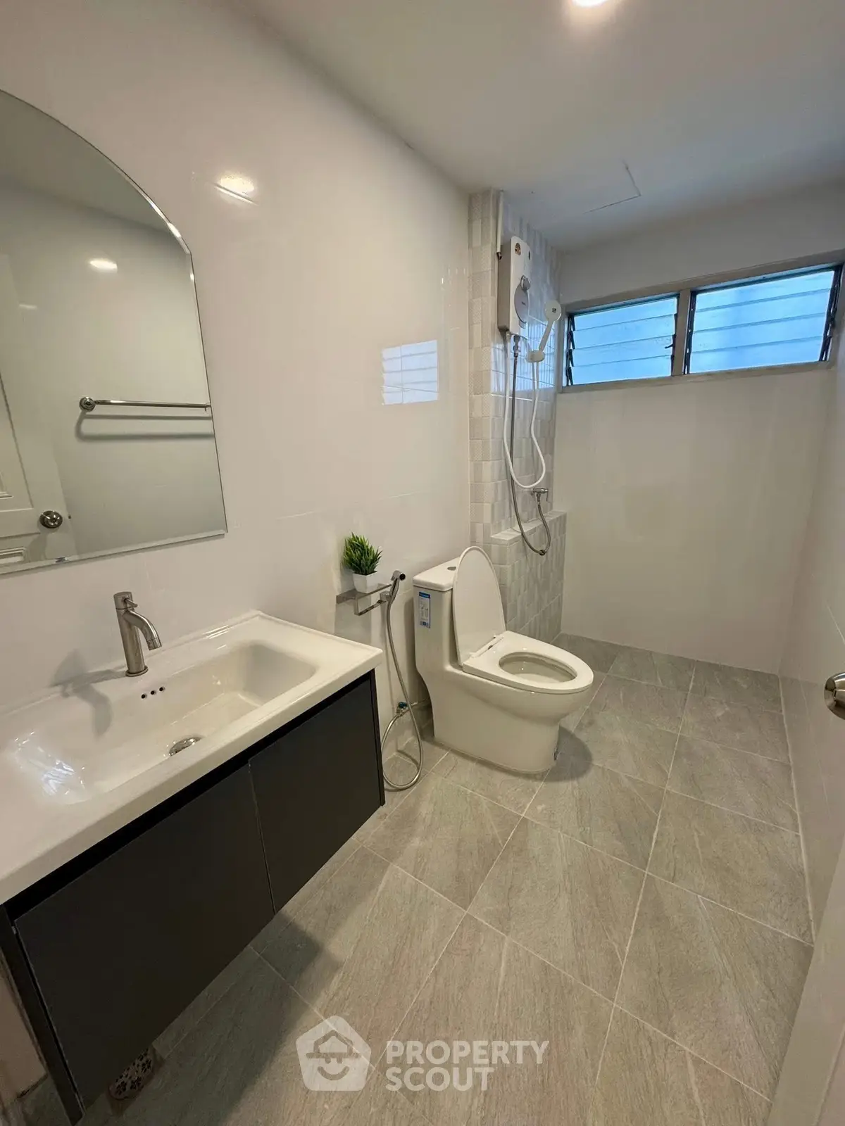 Modern bathroom with sleek fixtures and spacious layout