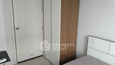 Cozy bedroom with modern wardrobe and minimalist design