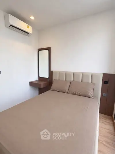 Cozy bedroom with modern air conditioning and elegant decor