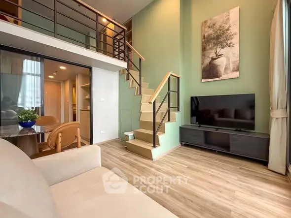 Modern duplex living room with high ceilings and stylish decor