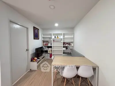Modern study room with sleek shelving and stylish furniture