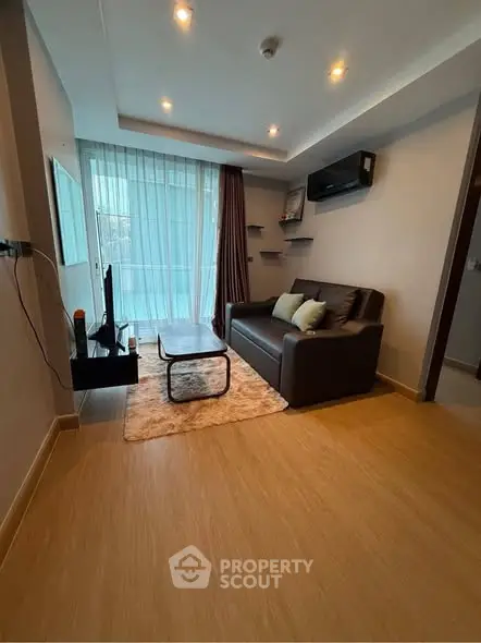 Modern living room with cozy sofa and stylish decor