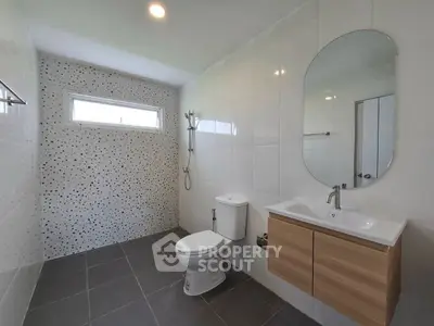 Modern bathroom with sleek fixtures and stylish tile design