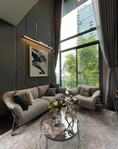 Luxurious high-ceiling living room with modern decor and large windows offering stunning city views.