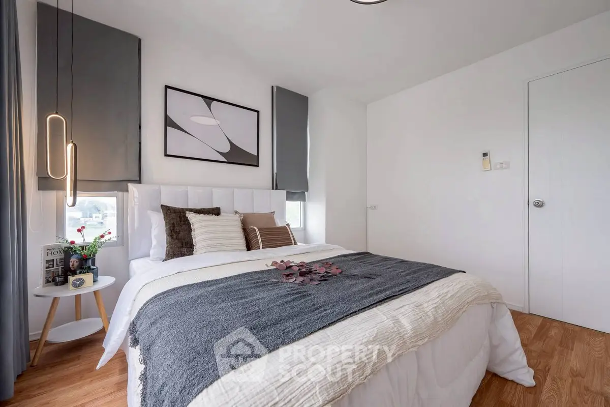 Modern bedroom with stylish decor and cozy ambiance