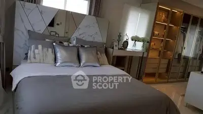 Luxurious bedroom with elegant decor and spacious walk-in closet