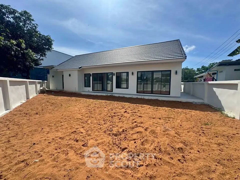 Charming single-story home with spacious yard and modern design, perfect for family living.