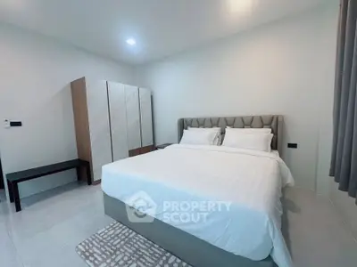 Modern bedroom with elegant decor and spacious wardrobe