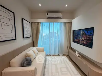 Modern living room with elegant decor and large window view