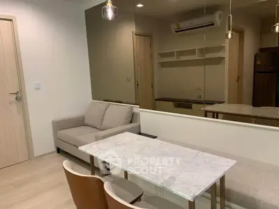 Modern living room with stylish furniture and air conditioning in a cozy apartment.