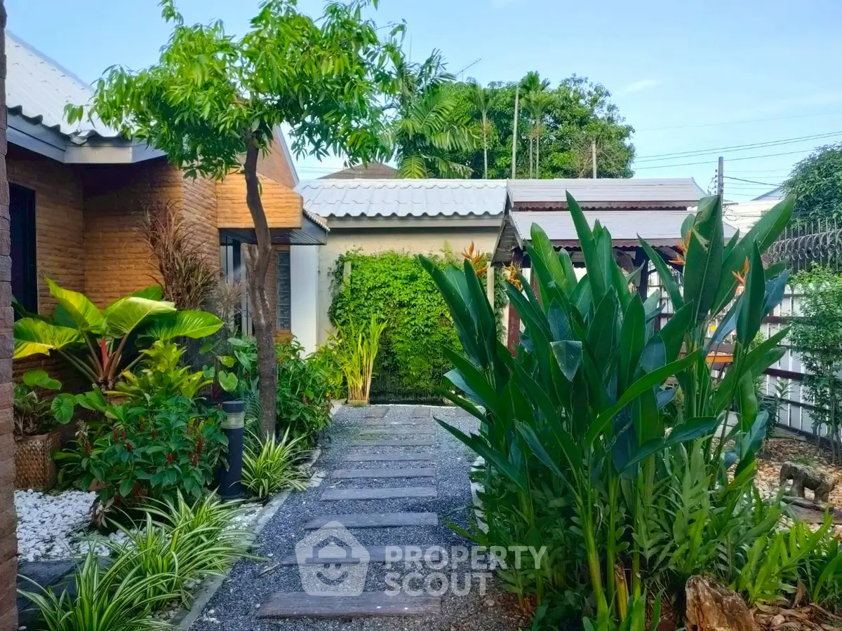 Charming garden pathway with lush greenery and modern landscaping