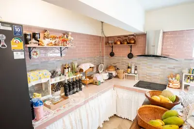 Charming kitchen with open layout and modern appliances, featuring a cozy and inviting atmosphere.